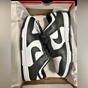 Nike women’s Black and White Sneakers
